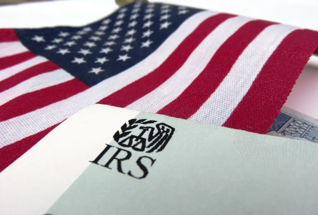 IRS folder with American flag in background