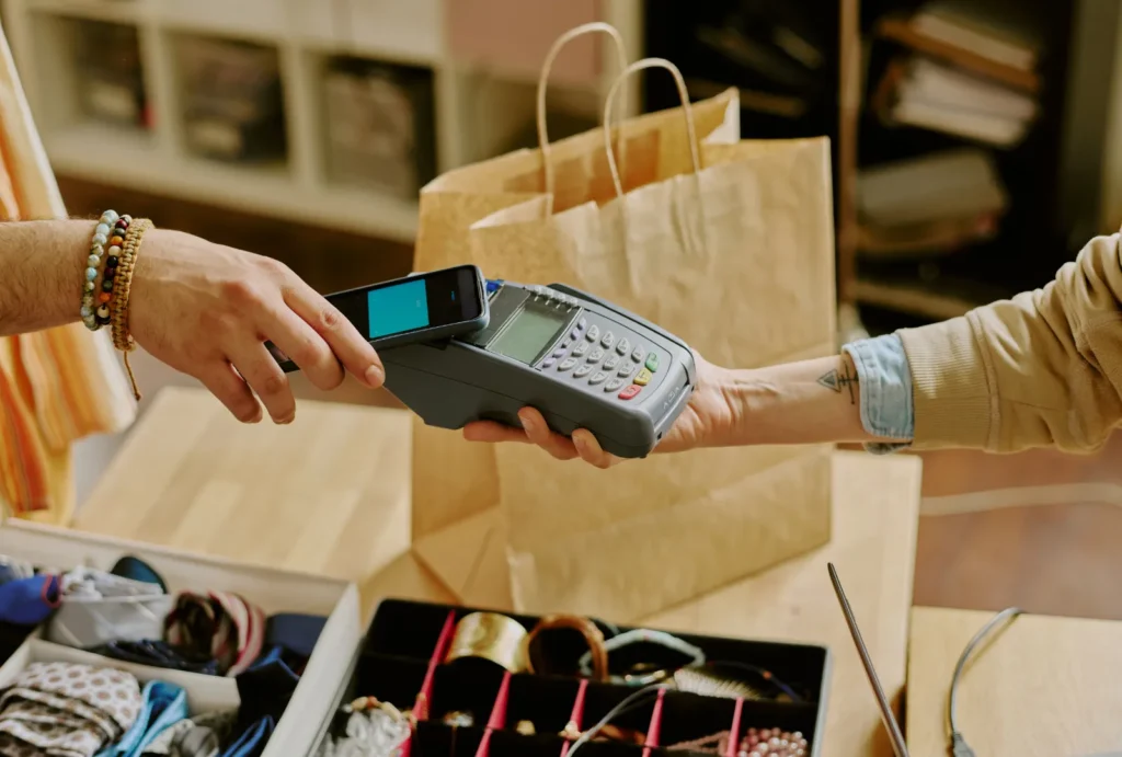 person purchasing something at a retail store