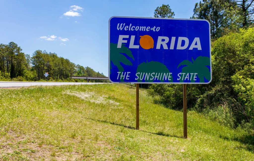 'Welcome to Florida' sign along highway along the highway